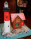 Gingerbread Lighthouse with Rocky Shoreline (also lights up) by Christa Savery Dunn